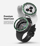 Galaxy Watch 4 Classic 42mm | Bezel Styling - Galaxy Watch 4 Classic 42mm | Two smartwatches with white and black bands featuring green stainless steel bezel covers.