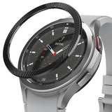 Galaxy Watch 4 Classic 46mm | Bezel Styling - A black textured metal bezel ring hovering above a silver smartwatch.