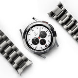 Galaxy Watch 4 Classic 42mm | Metal One Band - Silver smartwatch with white chronograph face and detached metal link band.