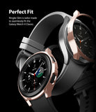 Galaxy Watch 4 Classic 46mm Case | Slim - Rose gold protective case being applied to a silver Galaxy Watch 4 Classic.
