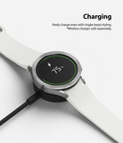 Galaxy Watch 5 / 4 (40mm) | Bezel Premium Styling - Smartwatch with silver bezel ring charging on a wireless dock.