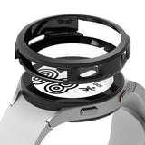 Galaxy Watch 4 (44mm) Case | Air Sports - Black protective watch case hovering above a silver Galaxy Watch 4.