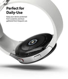 Galaxy Watch 5/4 44mm | Bezel Styling - Close-up of a silver smartwatch bezel attached to a white band, highlighting protective design.