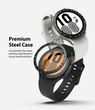 Galaxy Watch 5/4 44mm | Bezel Styling - Two smartwatches with black tachymeter bezels and silicone bands on a white background.