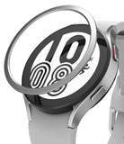 Galaxy Watch 5/4 44mm | Bezel Styling - A silver metallic bezel ring hovering above a Galaxy Watch face with a white strap.