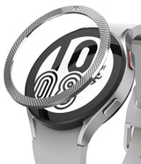 Galaxy Watch 5 / 4 (44mm) | Premium Bezel Styling - A silver textured bezel ring hovering above a Galaxy smartwatch.