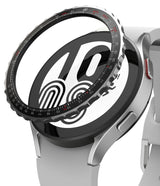 Galaxy Watch 5 / 4 (44mm) | Premium Bezel Styling - A metallic, notched bezel ring hovering above a silver smartwatch.