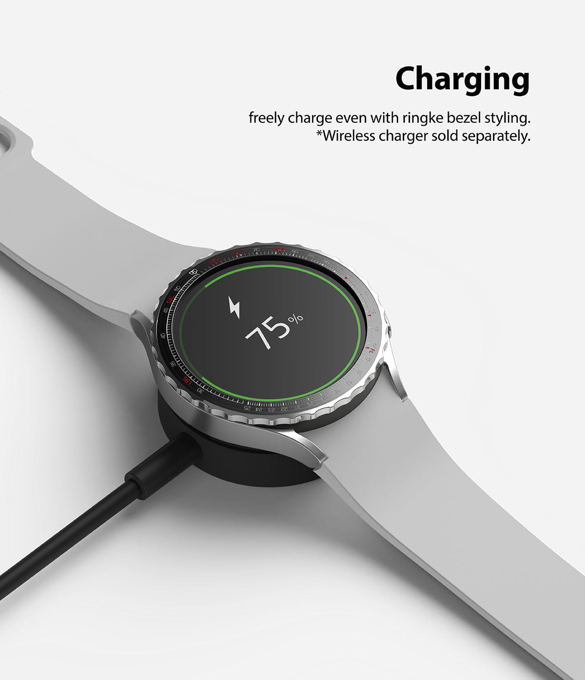 Galaxy Watch 5 / 4 (44mm) | Premium Bezel Styling - Smartwatch with silver bezel ring charging on a wireless dock.