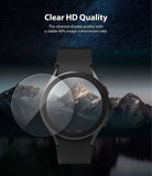 Galaxy Watch 5 / 4 (44mm) Screen Protector | Sapphire Crystal Glass - Galaxy Watch 5 / 4 (44mm) Screen Protector - A circular glass protector hovering over a black smartwatch against a mountain.