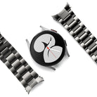 Galaxy Watch 6 / 5 / 4 (40mm) | Metal One Band - Silver smartwatch face centered between two detached metal link watch bands.