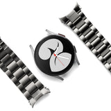 Galaxy Watch 6 / 5 / 4 (40mm) | Metal One Band - Silver smartwatch face centered between two detached metal link watch bands.
