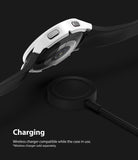 Galaxy Watch 4 40mm Case | Slim - White protective case on a Galaxy Watch 4 hovering above a black wireless charging puck.