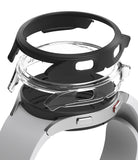 Galaxy Watch 4 (44mm) Case | Slim - Exploded view of a black and clear protective watch case hovering over a smartwatch.