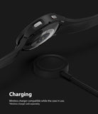 Galaxy Watch 4 (44mm) Case | Slim - Black Galaxy Watch 4 with slim protective case hovering above a wireless charging puck.