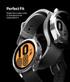 Galaxy Watch 4 (44mm) Case | Slim - Silver protective case being installed onto a black Galaxy Watch 4 against a black background.