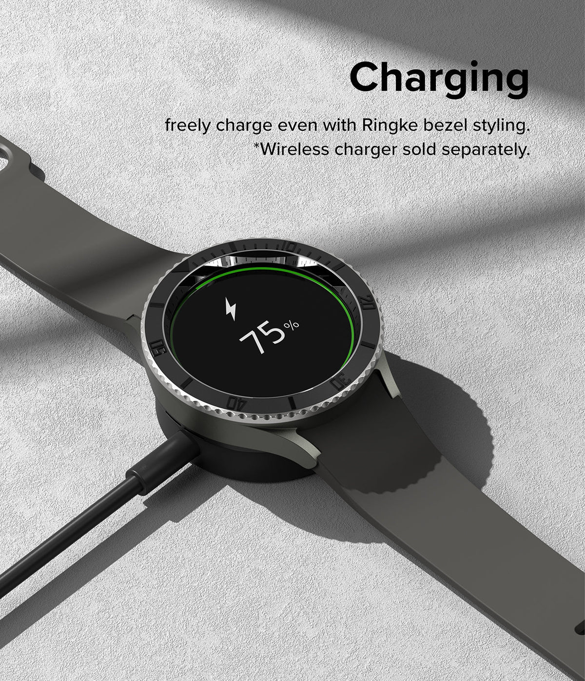 Galaxy Watch 5 Pro (45mm) | Premium Bezel Styling - Smartwatch with a black bezel ring charging on a wireless dock.