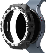 Galaxy Watch 5 / 4 (44mm) Case | Fusion-X - Rugged black and white protective bezel case hovering over a blue smartwatch.