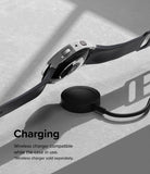 Galaxy Watch 5 (40mm) Case | Slim - A Galaxy Watch 5 with a slim silver case hovering above a black wireless charging puck.