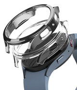 Galaxy Watch 5 44mm Case | Slim - A clear, slim protective case hovering above a blue Galaxy Watch 5 44mm.