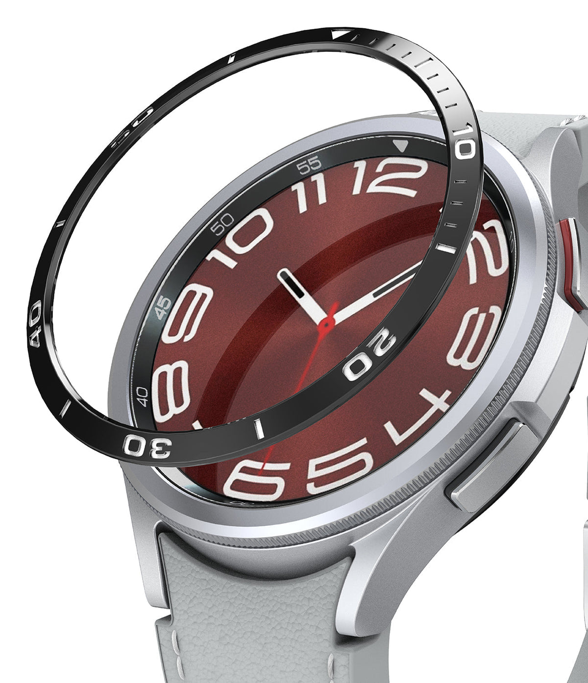 Galaxy Watch 6 Classic 47mm | Bezel Styling - A black adhesive bezel ring hovering above a silver smartwatch face.
