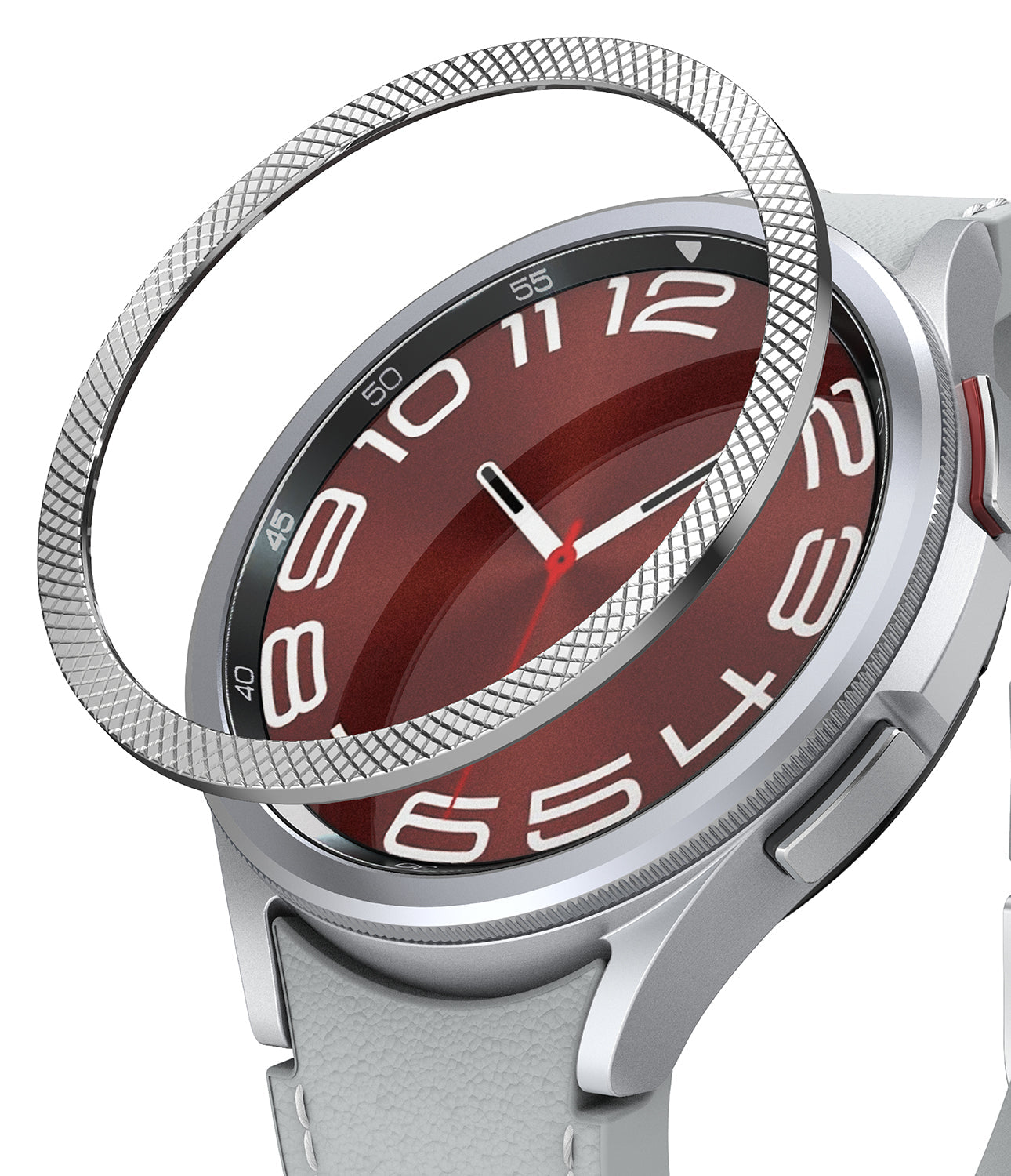 Galaxy Watch 6 Classic 47mm | Premium Bezel Styling - Silver textured bezel ring hovering above a smartwatch with a red face.