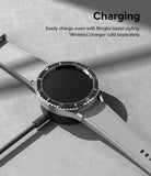 Galaxy Watch 6 Classic 47mm | Premium Bezel Styling - Smartwatch with black bezel styling on a wireless charging puck.
