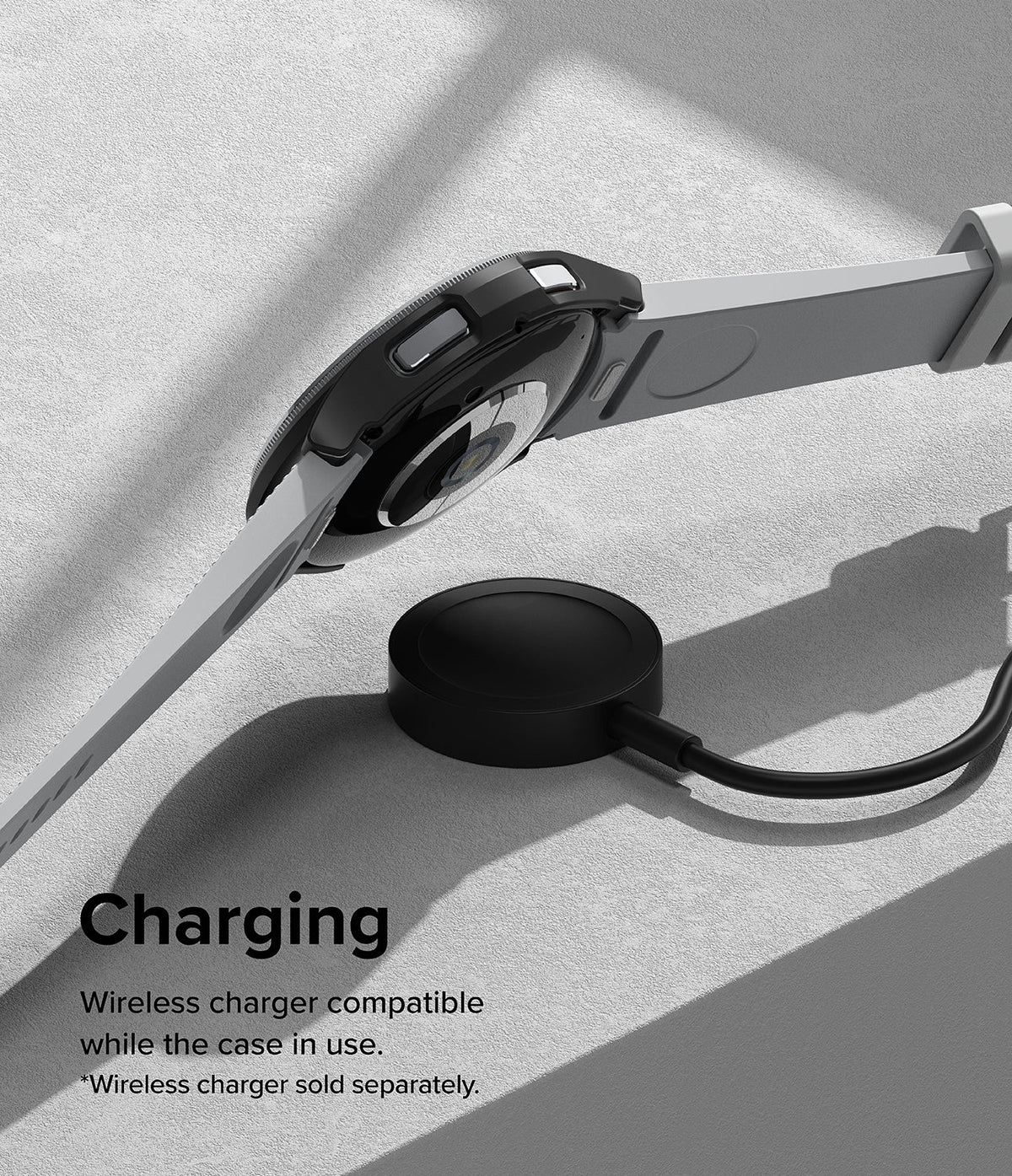 Galaxy Watch 6 Classic 43mm Case | Slim - Black protective watch case on a Galaxy Watch 6 hovering over a wireless charger.