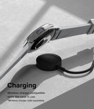 Galaxy Watch 6 Classic 43mm Case | Slim - Smartwatch with protective case hovering above a wireless charging puck.