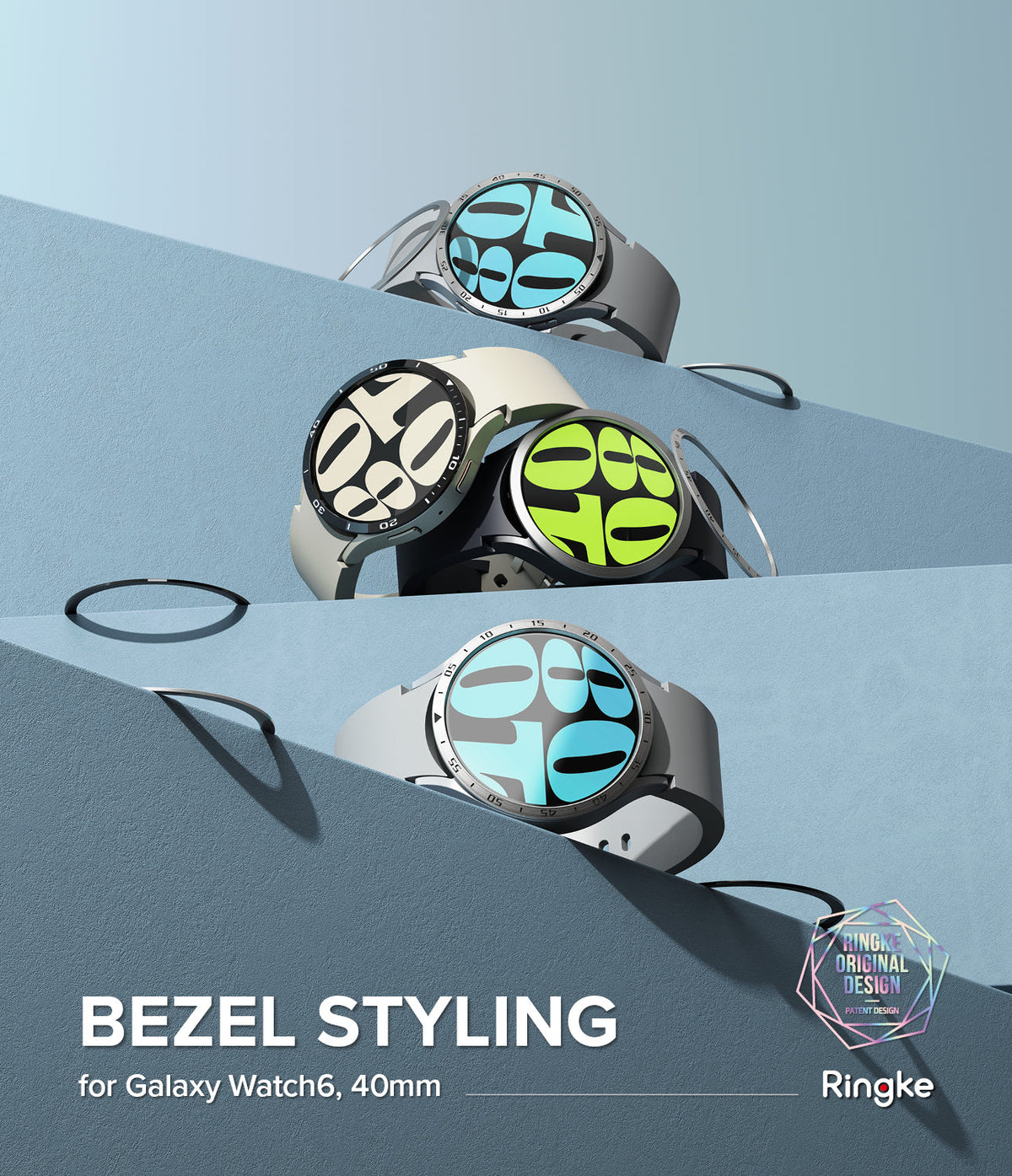 Galaxy Watch 6 40mm | Bezel Styling - Three Galaxy Watch 6 units with metallic bezel covers displayed on blue steps.