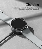 Galaxy Watch 6 (40mm) | Premium Bezel Styling - Galaxy Watch 6 with a black bezel accessory charging on a wireless dock.