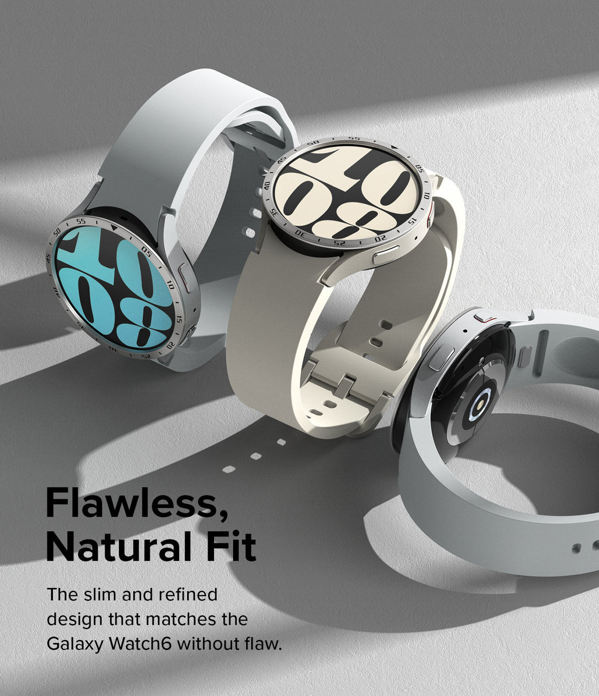 Galaxy Watch 6 44mm | Bezel Styling - Three Galaxy Watch 6 units with metallic bezel rings and light-colored silicone bands.