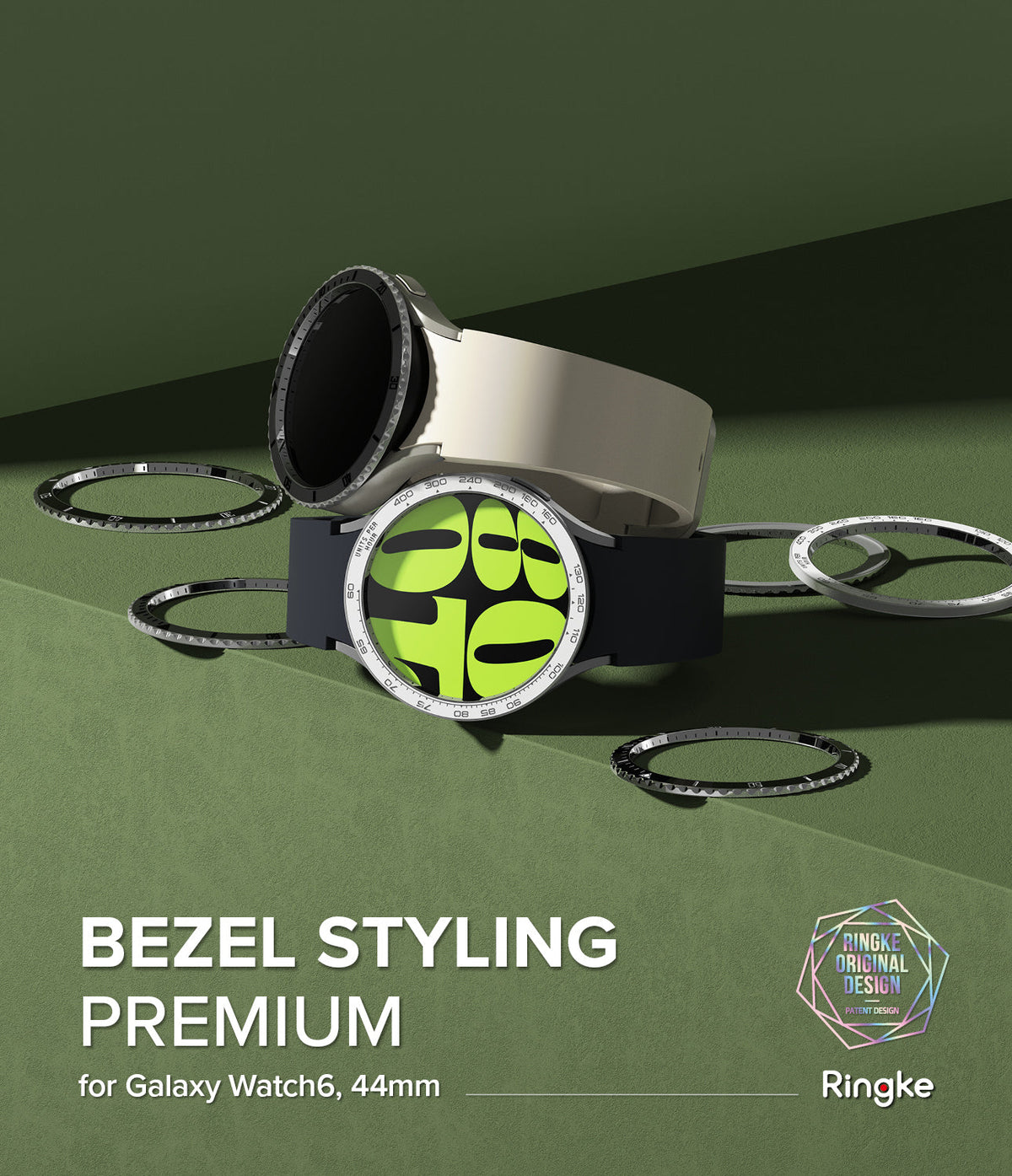 Galaxy Watch 6 (44mm) | Premium Bezel Styling - Two Galaxy Watch 6 units with tachymeter bezel rings on a green surface.