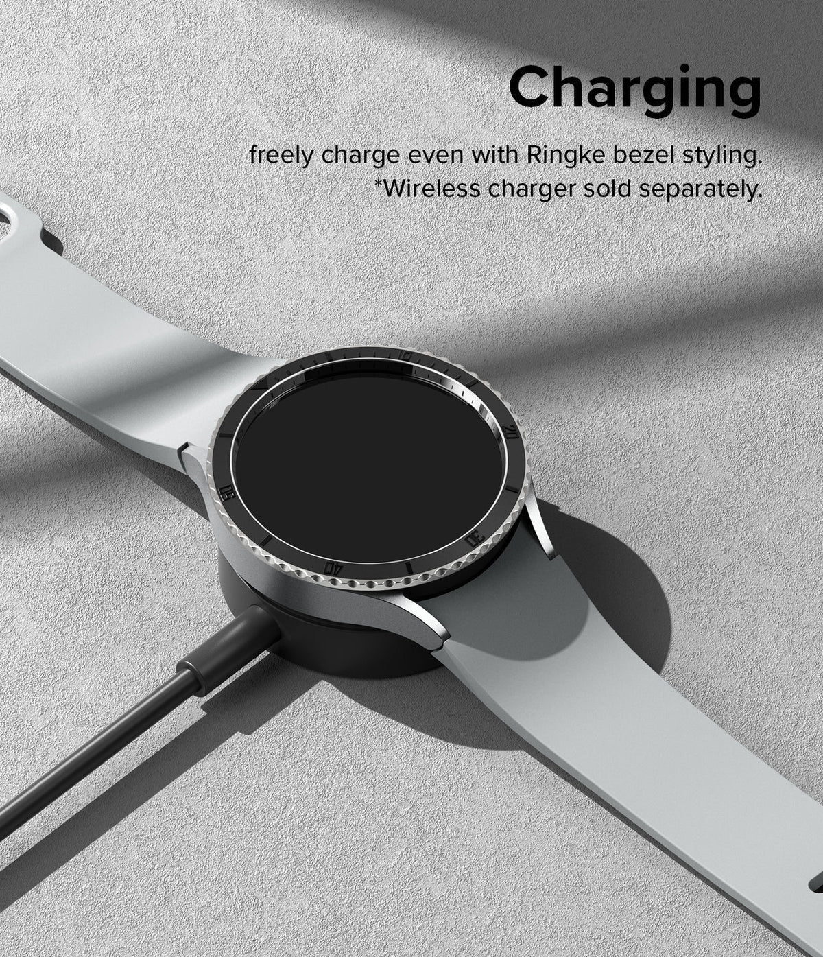 Galaxy Watch 6 (44mm) | Premium Bezel Styling - Smartwatch with bezel styling on a wireless charging puck.