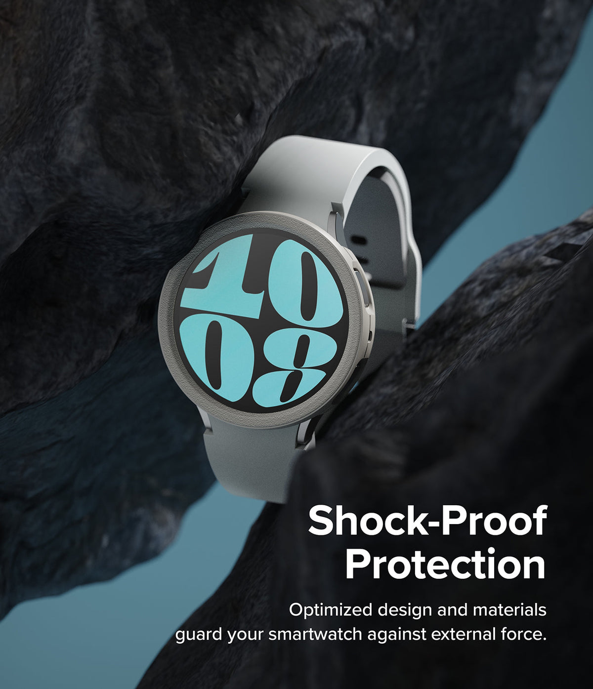 Galaxy Watch 6 44mm Case | Air Sports - Gray watch case suspended between dark, jagged rocks with shock-proof text.