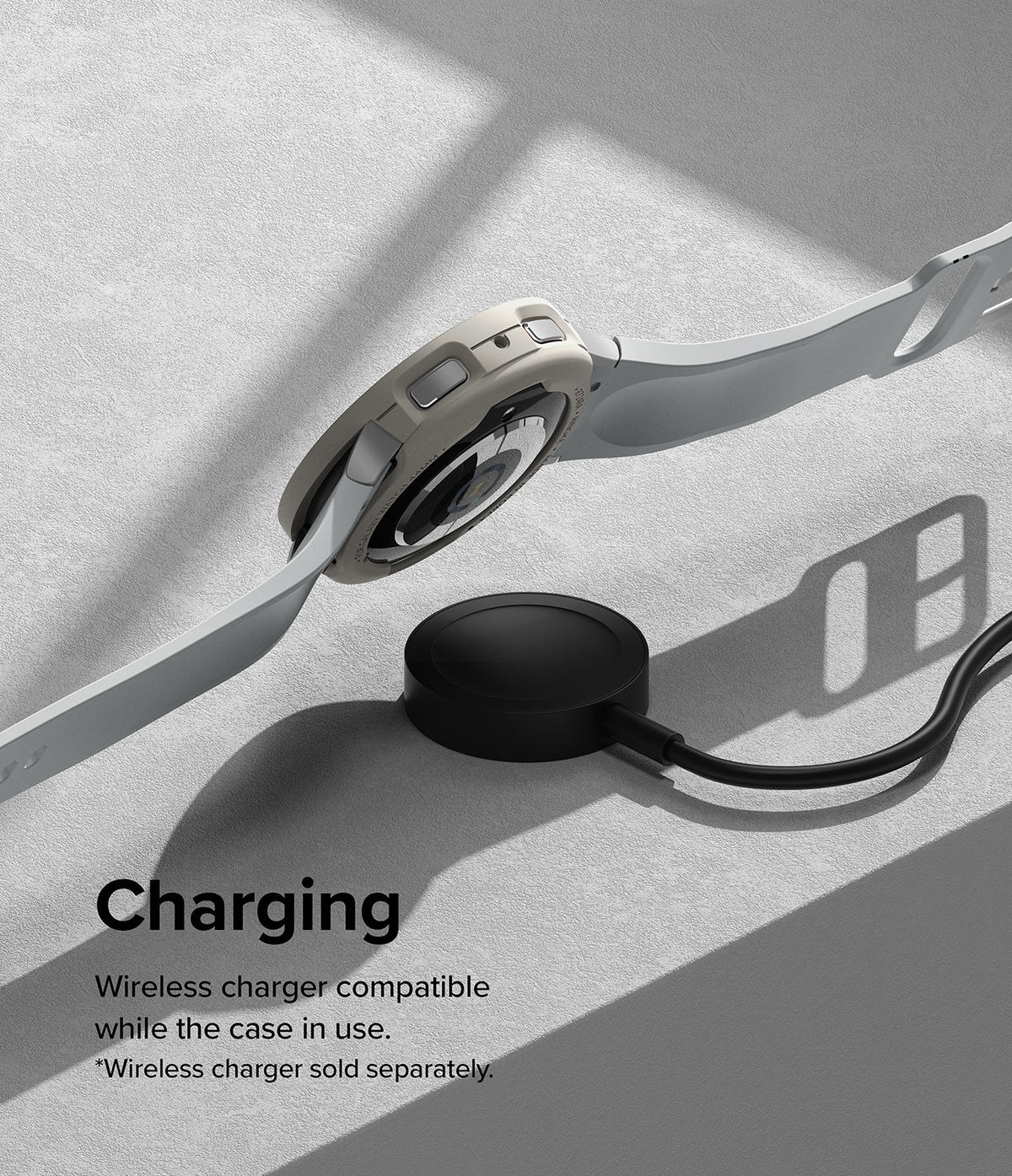 Galaxy Watch 6 44mm Case | Air Sports - A Galaxy Watch 6 with a beige protective case resting on a black wireless charger.