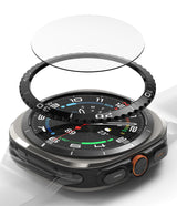 Galaxy Watch Ultra | Bezel Styling & Glass - Exploded view of a smartwatch with a protective glass and black bezel ring.