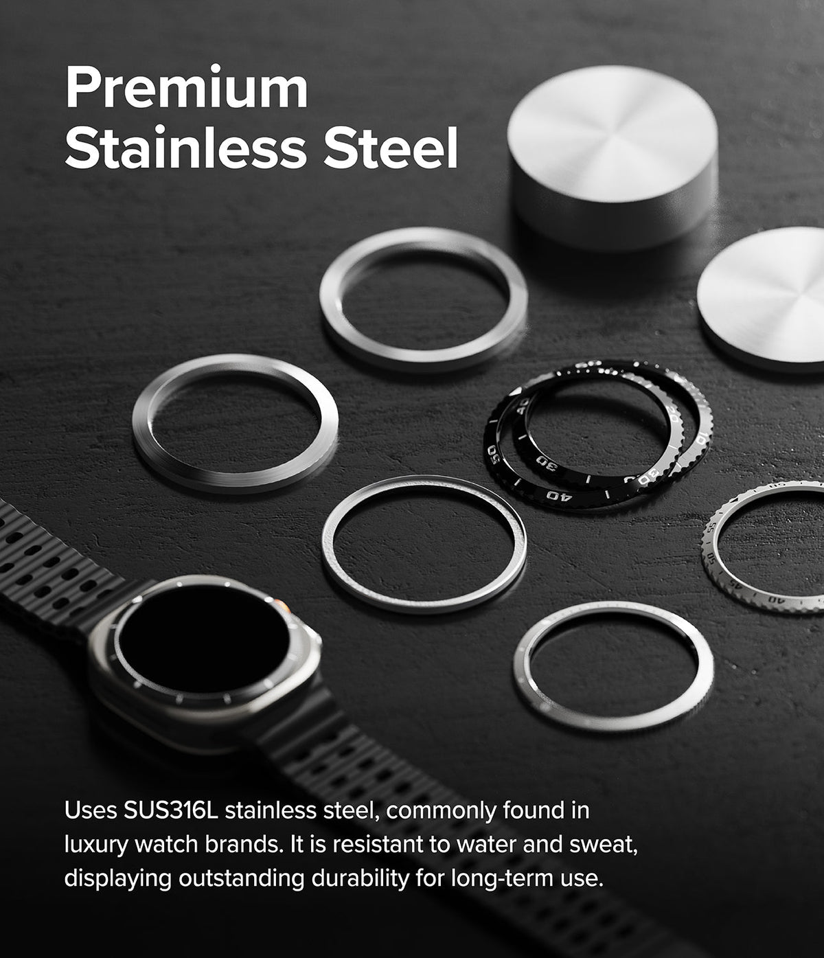 Galaxy Watch Ultra | Bezel Styling & Glass - Stainless steel watch bezels and components arranged on a dark surface.