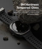 Galaxy Watch Ultra | Bezel Styling & Glass - A rugged smartwatch screen protected by a large rock, highlighting 9H tempered glass.