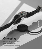 Galaxy Watch Ultra | Slim & Glass - A Galaxy Watch with a clear protective case hovering above a wireless charging puck.