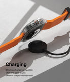 Galaxy Watch Ultra | Slim Extend & Glass - A Galaxy Watch Ultra with a clear protective case charging on a wireless puck.