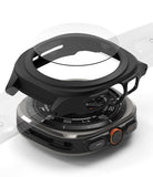 Galaxy Watch Ultra | Slim Extend & Glass - Exploded view of a black protective watch case and glass screen protector above a Galaxy Watch Ultra.