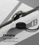 Galaxy Watch 7 (40mm) | Slim & Glass - A Galaxy Watch 7 with a clear protective case hovering above a wireless charging puck.