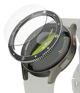 Galaxy Watch 7 44mm | Bezel Styling Premium & Glass - A black metal bezel ring and glass screen protector hovering above.