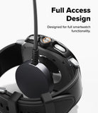 Galaxy Watch 8 Classic 46mm Case | Slim - Black watch case on a smartwatch being charged by a magnetic cable.