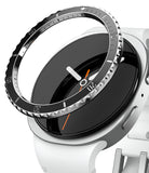 Galaxy Watch 9 / 8 40mm | Bezel Styling Premium - A close-up of a smartwatch with a white silicone strap and a silver-toned bezel, shown against a clean white background.