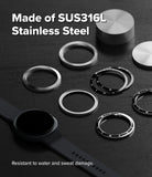 Galaxy Watch 9 / 8 44mm | Bezel Styling Premium - Several silver stainless steel watch band rings and a black smartwatch strap are arranged on a dark textured surface, with text reading 'Made of SUS316L Stainless Steel' and 'Resistant to water and sweat damage.'.