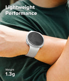 Galaxy Watch 9 / 8 44mm Case | Slim - A close-up of a person's wrist wearing a light gray smartwatch with a dark screen, over a dark green shirt. White text overlays read 'Lightweight Performance' and 'Weight 1.