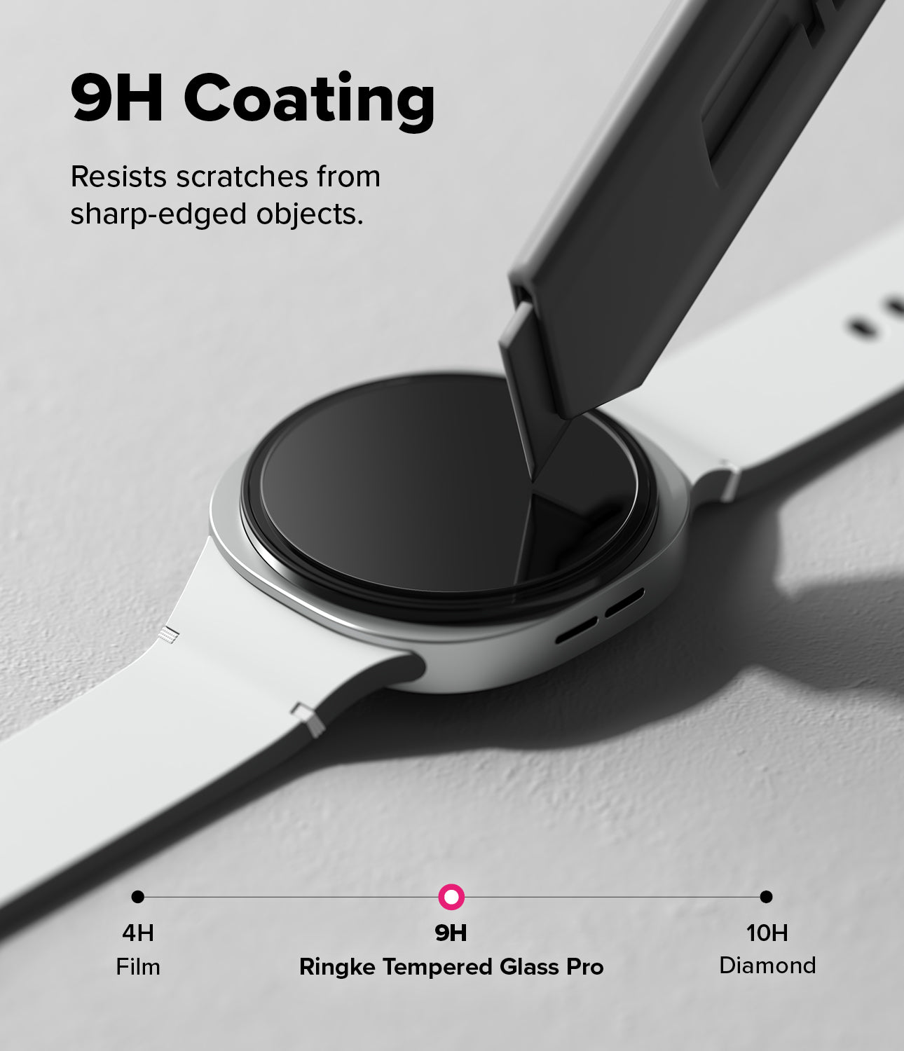 Galaxy Watch 8 44mm Screen Protector | Tempered Glass Pro - A utility knife scrapes a Galaxy Watch screen protected by 9H tempered glass.
