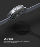 Galaxy Watch Active 2 (44mm) | Air Sports Matte Clear + Bezel Styling - Smartwatch with protective case charging wirelessly.