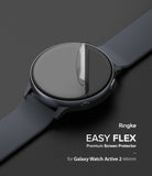 Galaxy Watch Active 2 (44mm) | Easy Flex - A transparent screen protector being applied to a black Galaxy Watch Active 2.